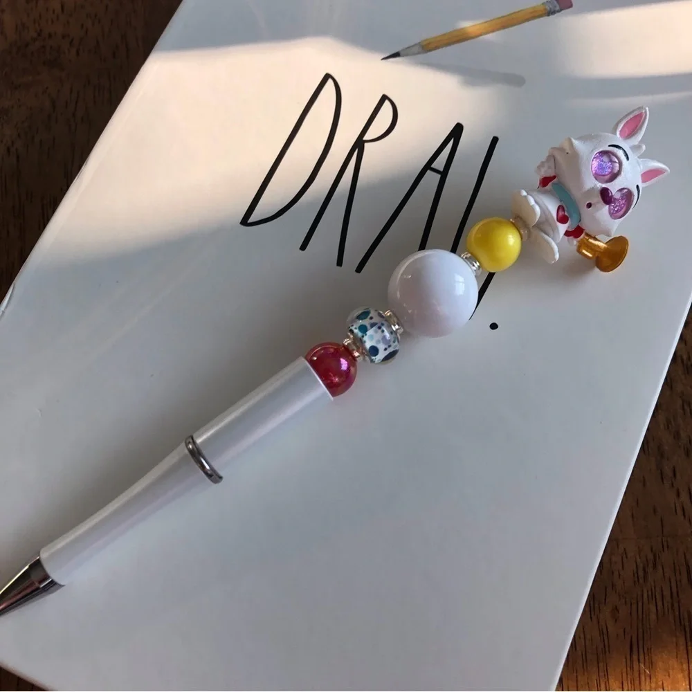 Disney doorables: Alice in Wonderland: White Rabbit handmade beaded pen